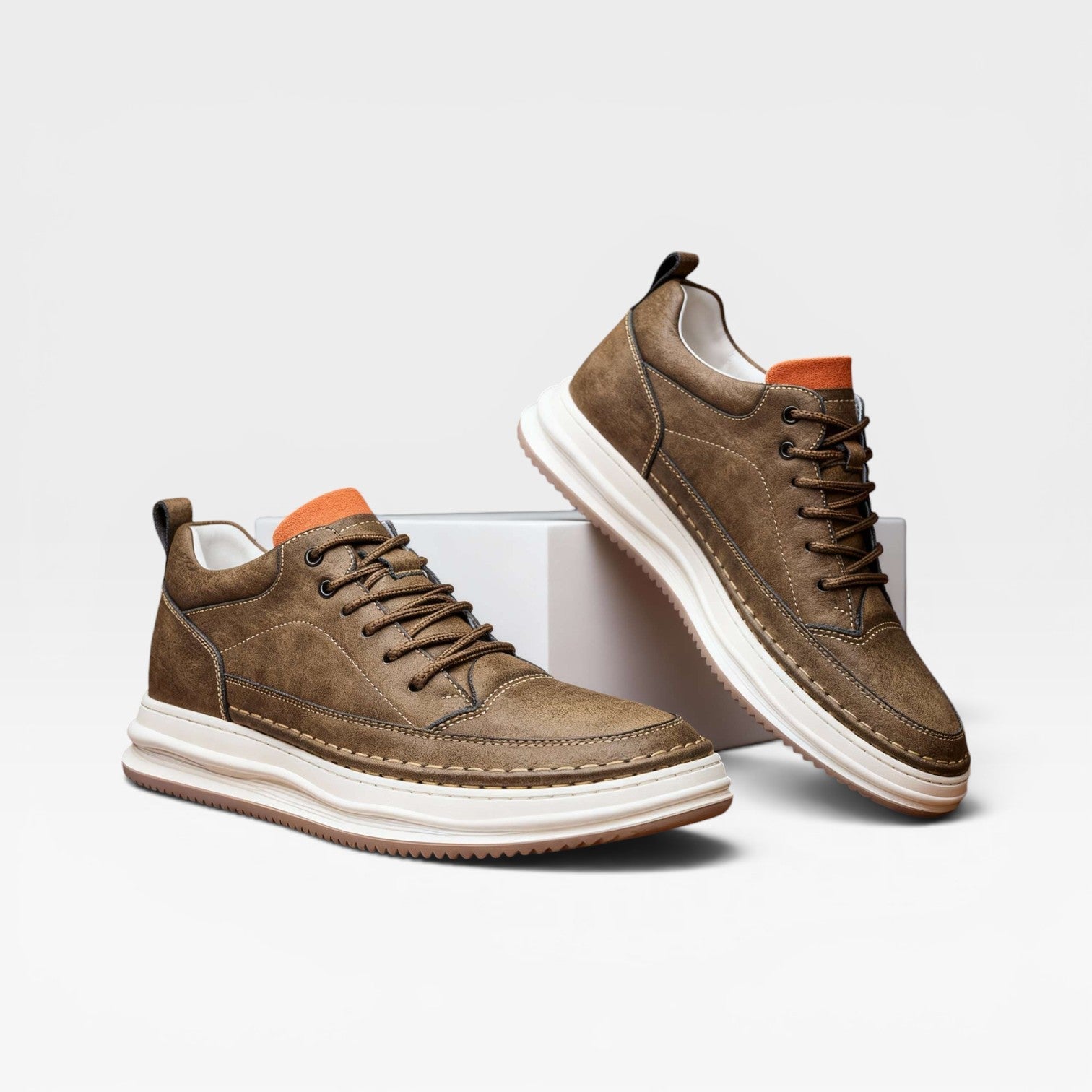 Detail view men's burnished leather lace-up trainers stitching