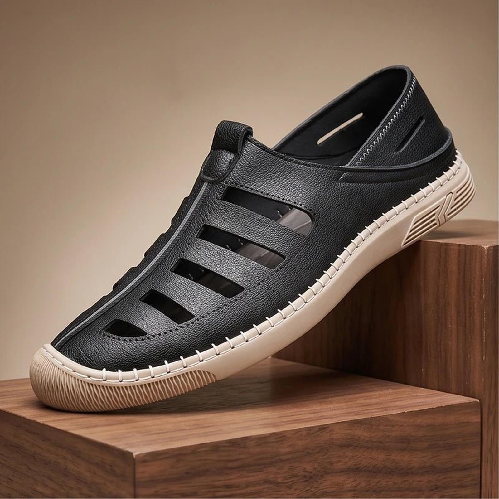 Men's leather fisherman sandals cutout ventilation detail - close-up