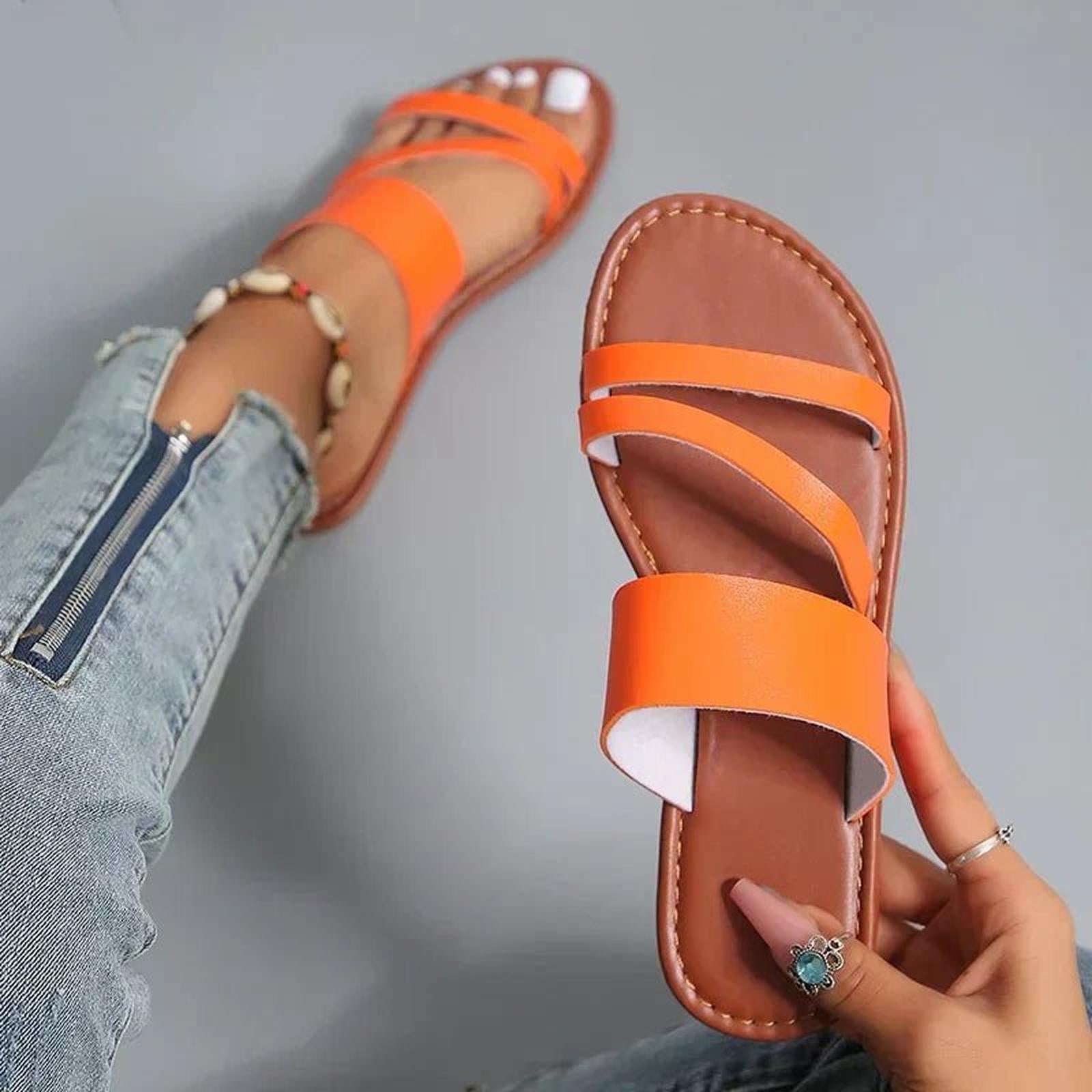 women's cross-strap flat sandals - worn view