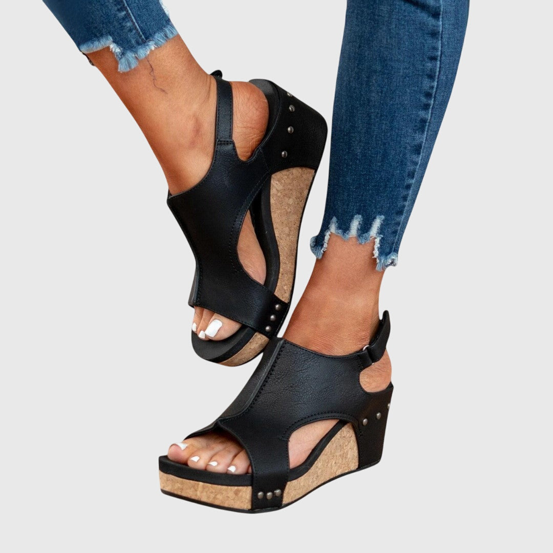Sole view of women's orthopedic open toe sandals with arch support