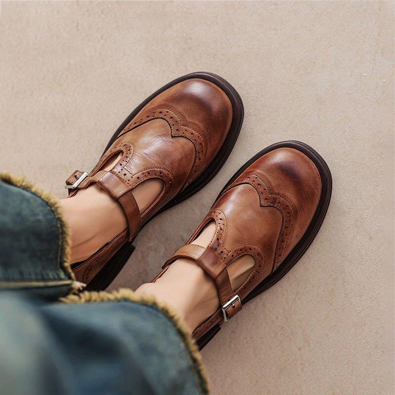 women's perforated Mary Jane buckle flats in Brown - front view